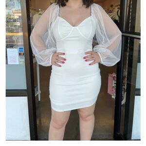 The I Do Sheer Sleeve Dress from Charleys Boutique size small.